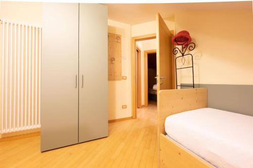 Ein Bett oder Betten in einem Zimmer der Unterkunft Cesa Antermoia