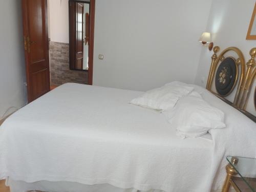 Ein Bett oder Betten in einem Zimmer der Unterkunft Bungalows en Residencial el Cantil - Piscina