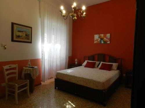 Ένα ή περισσότερα κρεβάτια σε δωμάτιο στο Casa a Corte nel centro storico