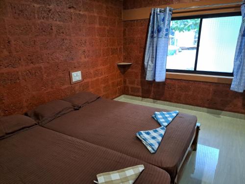 Postel nebo postele na pokoji v ubytování Palm Beach Resort