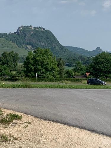a car parked on the side of a road at Apartament Blumenblick in Rielasingen-Worblingen
