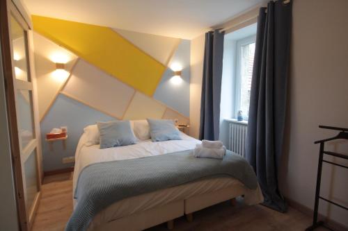 Katil atau katil-katil dalam bilik di Le Manoir de Kérofil ** Gîte et chambres d'hôtes **
