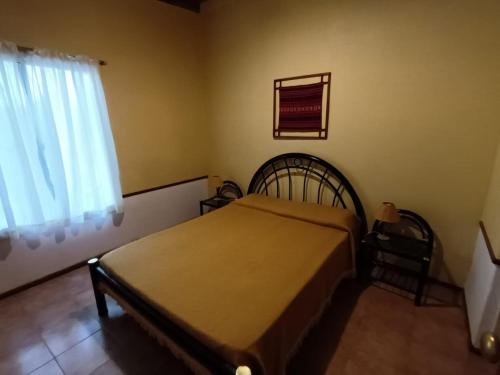 Una cama o camas en una habitación de Vila Sornico