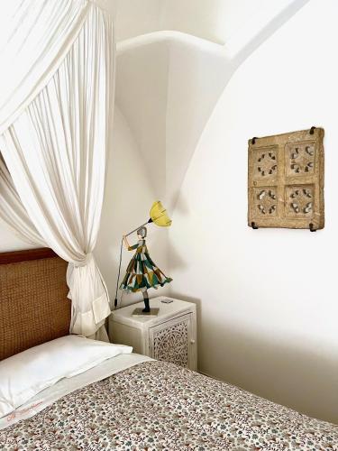 Postel nebo postele na pokoji v ubytování Al Bastione del Borgo Saraceno, Varigotti