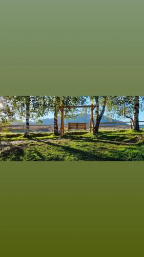 two pictures of a park with a bench and trees at Organic Family Farm in Žabljak