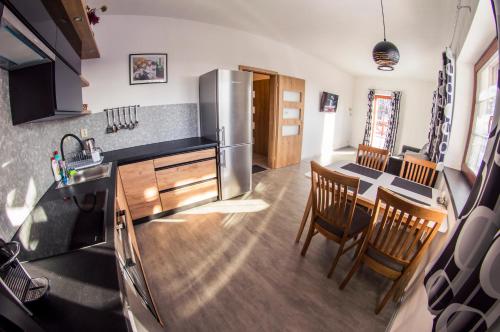 Kuchyň nebo kuchyňský kout v ubytování Apartmán Benecko 213