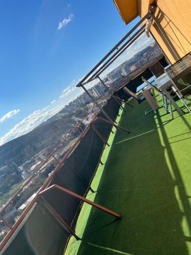 a view from the top of a building looking down at the water at -Self-Check- Luxury view penthouse on the roof of City in Nitra