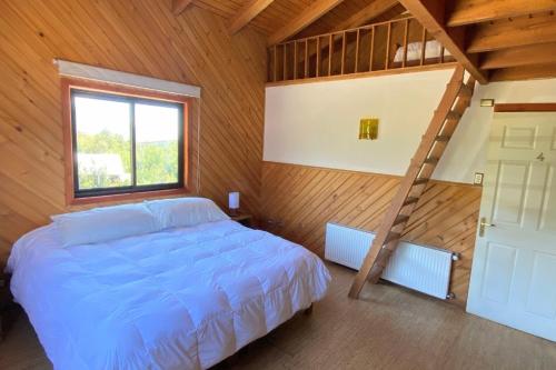 MI Lodge Las Trancas Hotel & Spaにあるベッド