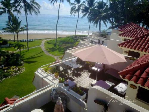 an aerial view of a house with a view of the ocean at CABARETE BEACH HOUSES the NANNY ESTATES in Cabarete