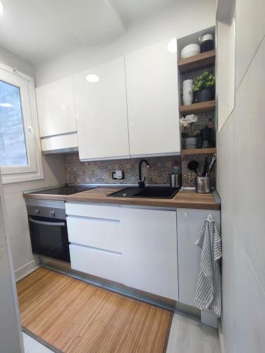 Køkken eller tekøkken på Beach accommodation apartment