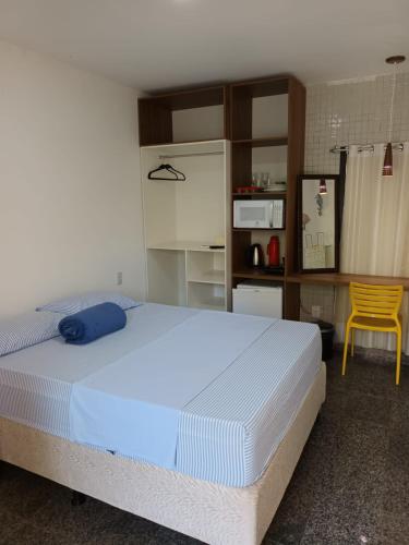 Кровать или кровати в номере SEGUNDA CASA - Seu cantinho em Guarapari, 1 minuto a pé da Praia do Morro! Suítes confortáveis e modernas - Para casal ou para grupos de até 4 pessoas