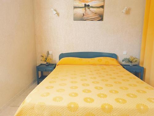 Postel nebo postele na pokoji v ubytování Residence Maïna