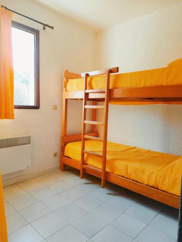 Postel nebo postele na pokoji v ubytování Residence Maïna