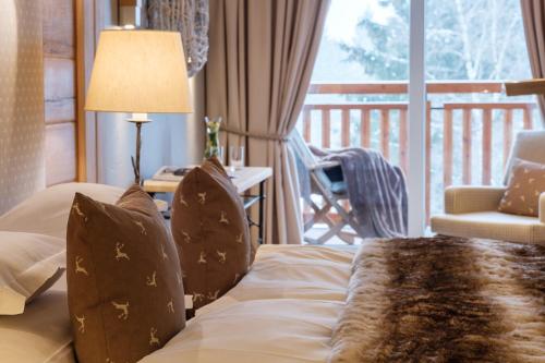 Postel nebo postele na pokoji v ubytování Sonnenalp Resort