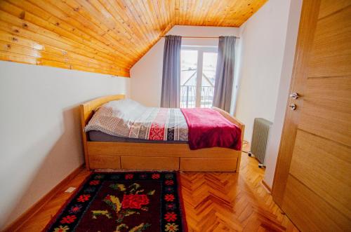 En eller flere senger på et rom på Holiday home Mons Albis Bjelašnica