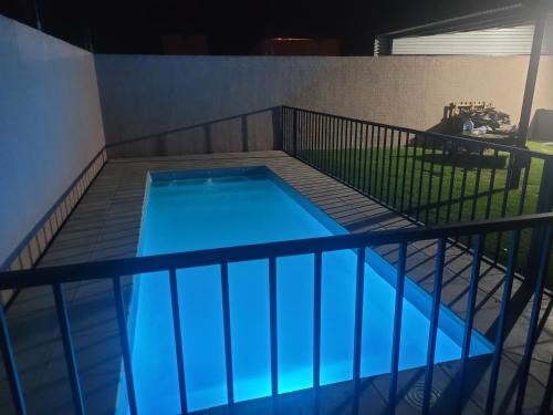 a small blue swimming pool on a balcony at La cabala in General Alvear