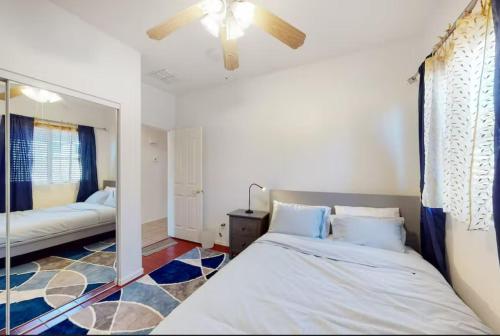 a bedroom with a bed and a ceiling fan at NEW! Stunning Peaceful Peoria Home - Very Close to Sports Complex in Peoria