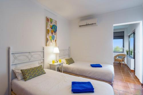 A bed or beds in a room at Villa Maria by Villa Plus