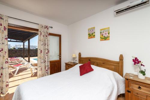 Postel nebo postele na pokoji v ubytování Villa Pepe by Villa Plus
