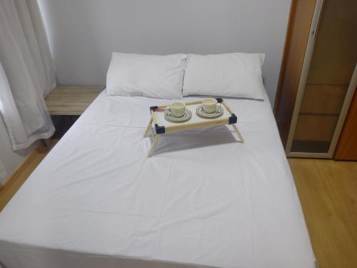 Ένα ή περισσότερα κρεβάτια σε δωμάτιο στο Apartamento 150m praia, vista p Mar, e Piscina na cobertura