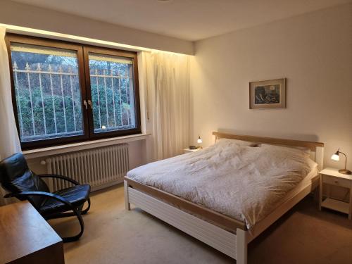 Säng eller sängar i ett rum på Panoramahaus Sauerland