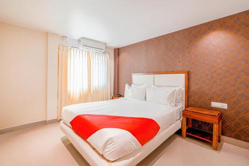 Ένα ή περισσότερα κρεβάτια σε δωμάτιο στο FabHotel Phoenix Brookfield - Nr Kundalahalli Main Road