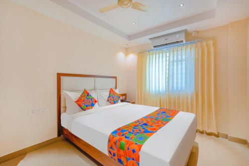 Ένα ή περισσότερα κρεβάτια σε δωμάτιο στο FabHotel Phoenix Brookfield - Nr Kundalahalli Main Road