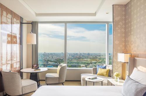 Coin salon dans l'établissement Eastin Grand Hotel Phayathai