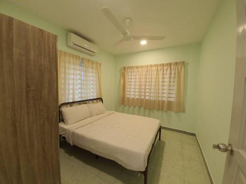 Voodi või voodid majutusasutuse Go Homestay @ Kuala Kubu Bharu toas