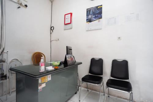 Фотография из галереи RedDoorz at Jalan Bangau Palembang в городе Палембанг