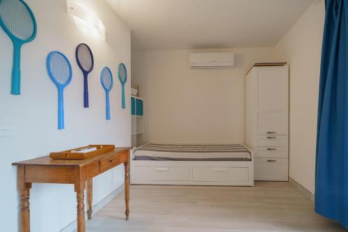 Postel nebo postele na pokoji v ubytování Terrazza sulla Biodola - Goelba
