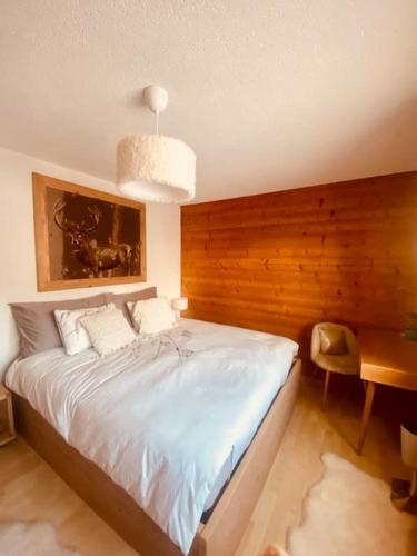 Postel nebo postele na pokoji v ubytování 3,5 pces - 80m2- Villars-sur-Ollon