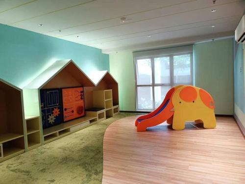 a room with a room with an elephant toy in it at Timurbay Seafront Residence By Ozzy Azizi in Kuantan