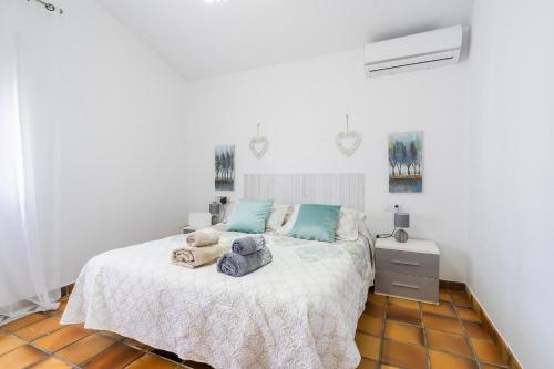 Ένα ή περισσότερα κρεβάτια σε δωμάτιο στο Chalet El Santiscal