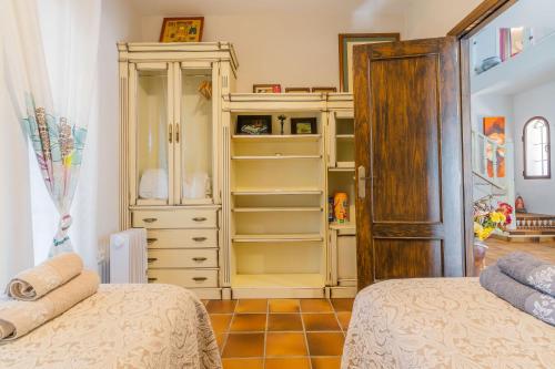 Ένα ή περισσότερα κρεβάτια σε δωμάτιο στο Chalet El Santiscal