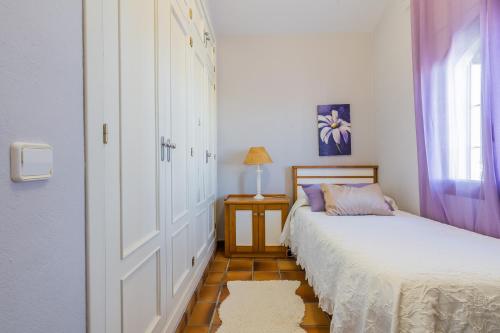 Ένα ή περισσότερα κρεβάτια σε δωμάτιο στο Chalet El Santiscal