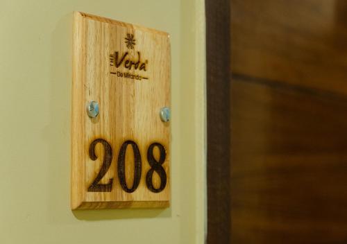 a lightswitch on a wall with the number at The Verda De Miranda Resort Morjim North Goa in Morjim