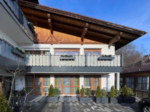 an external view of a building with a balcony at Wildgrün in Pfronten