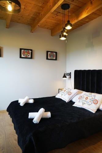 Postel nebo postele na pokoji v ubytování Resort Mielenko