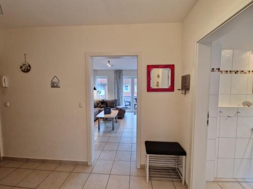 a hallway with a living room and a dining room at Ferienwohnung Rieke in Norddeich