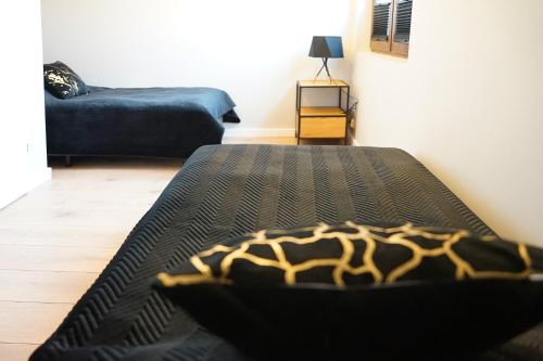 Postel nebo postele na pokoji v ubytování Resort Mielenko