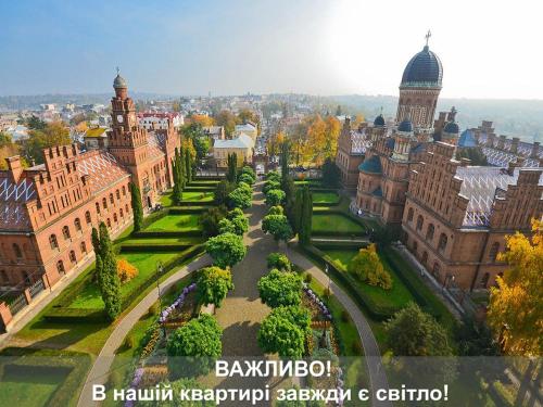 an aerial view of a park in front of a building at Apartment "Comfort" in the Center in Chernivtsi