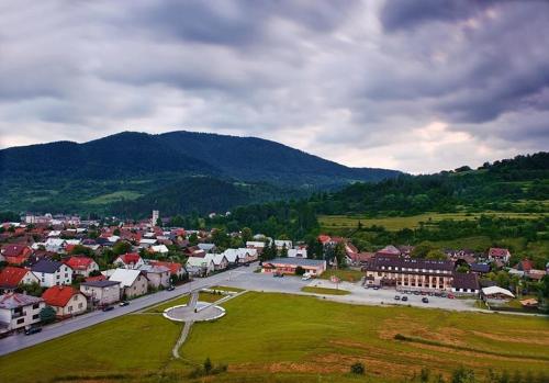 an aerial view of a town in the mountains at Hotel Gold in Terchová
