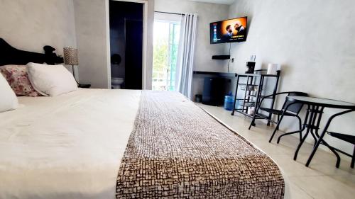 Postel nebo postele na pokoji v ubytování Cozumel 400A - Vacation Rental