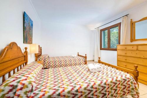 Кровать или кровати в номере Villa Binimelis