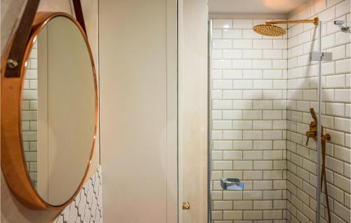 a bathroom with a mirror and a shower at Nice Home In Stare Czaple With Wifi in Stare Czaple