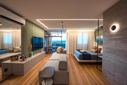 Ένα ή περισσότερα κρεβάτια σε δωμάτιο στο Studio Maravilhoso em Itapoã