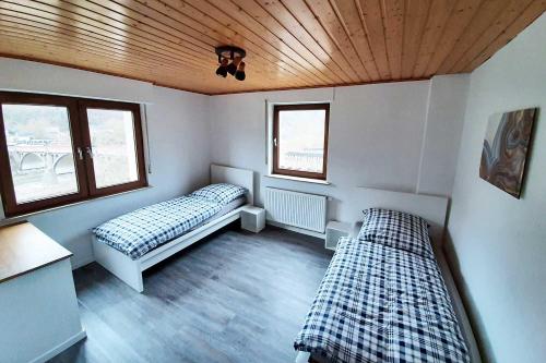 Katil atau katil-katil dalam bilik di Work & Stay Apartments in Hönningen