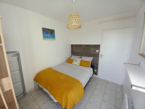 Posteľ alebo postele v izbe v ubytovaní Appart 2/4 pers proche centre avec Balcon, Parking