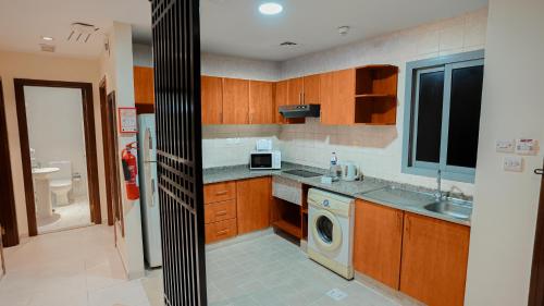  Xclusive Hotel Apartments -  Room  picture :   Tea/Coffee maker    Shower    Bath                           